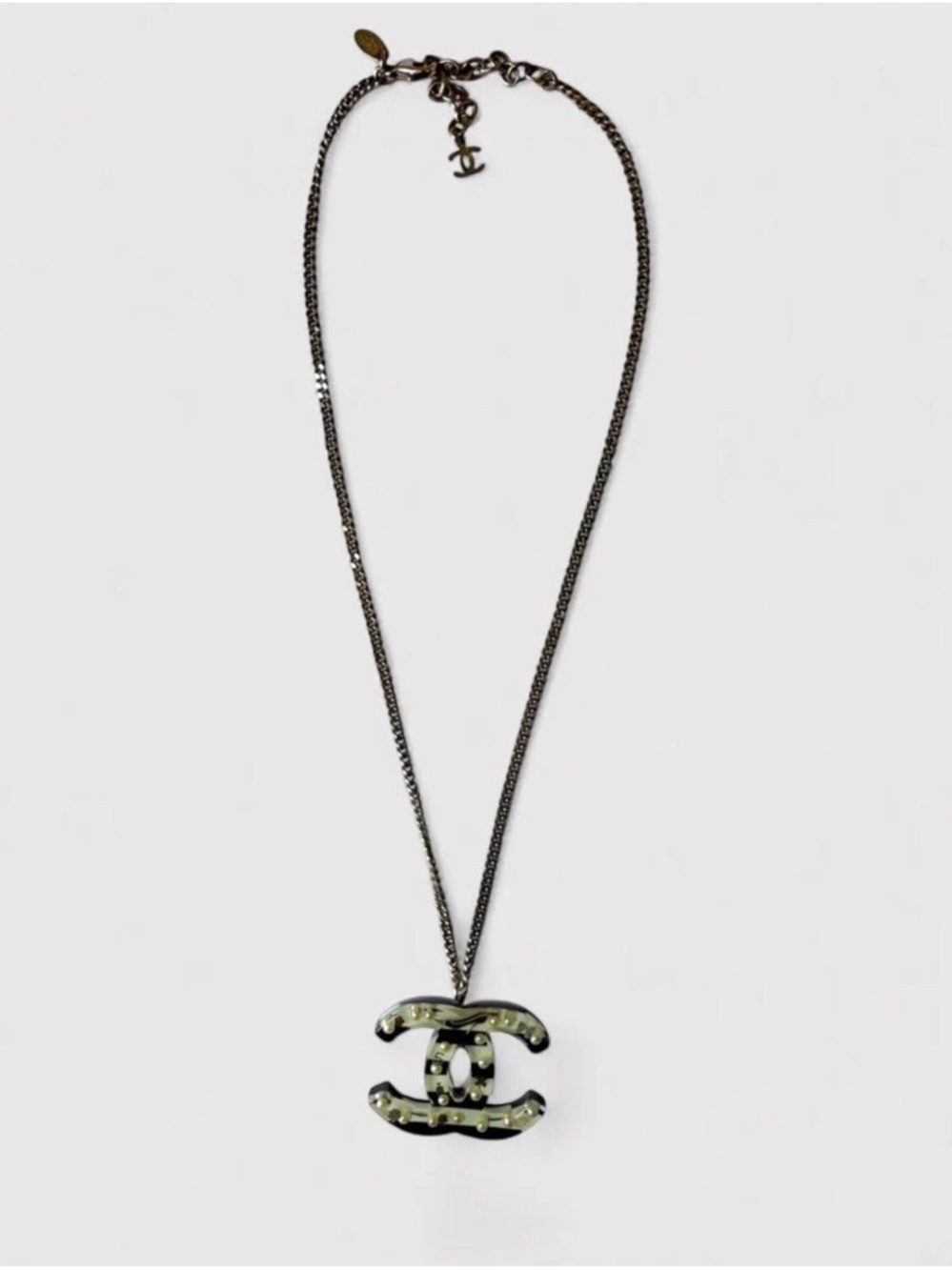 CHANEL Black and Gold CC Pendant Necklace